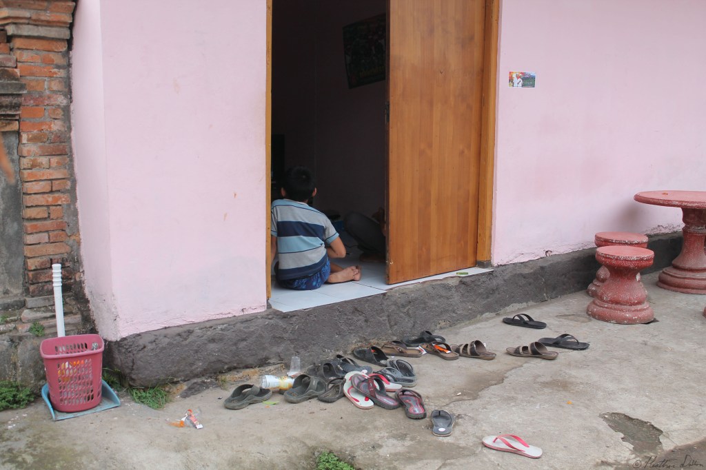 Photograph of Boy playing video games