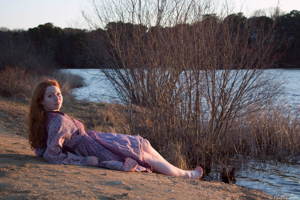 Photograph woman at pond Dennis