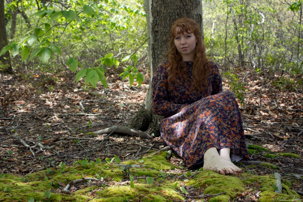 Mary on moss in nature photograph